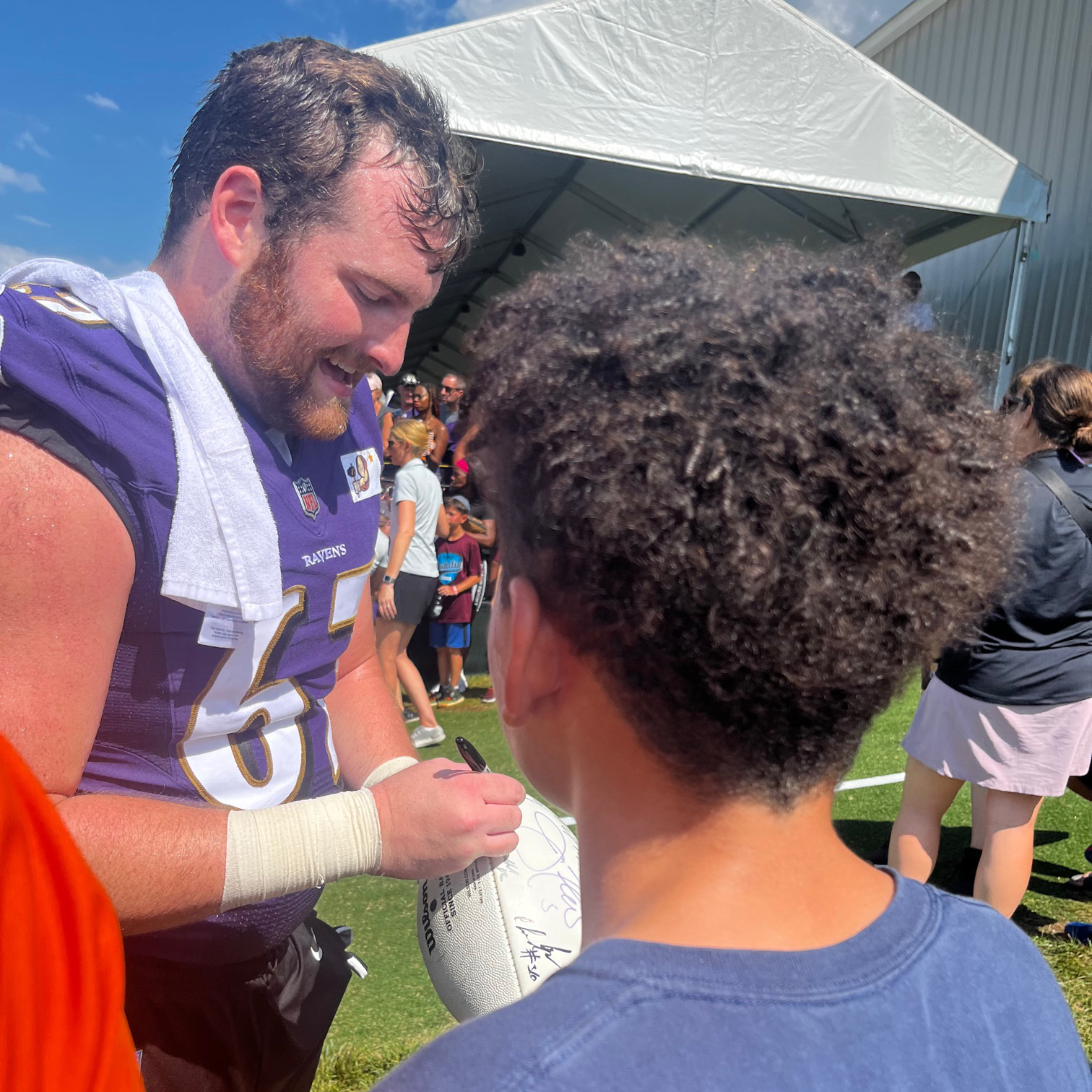 Baltimore scholars get up close and personal with the Baltimore Ravens at a training camp