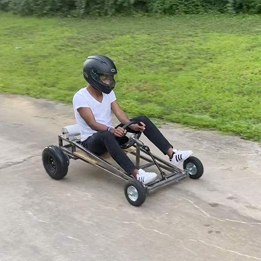 LaRon riding a go kart