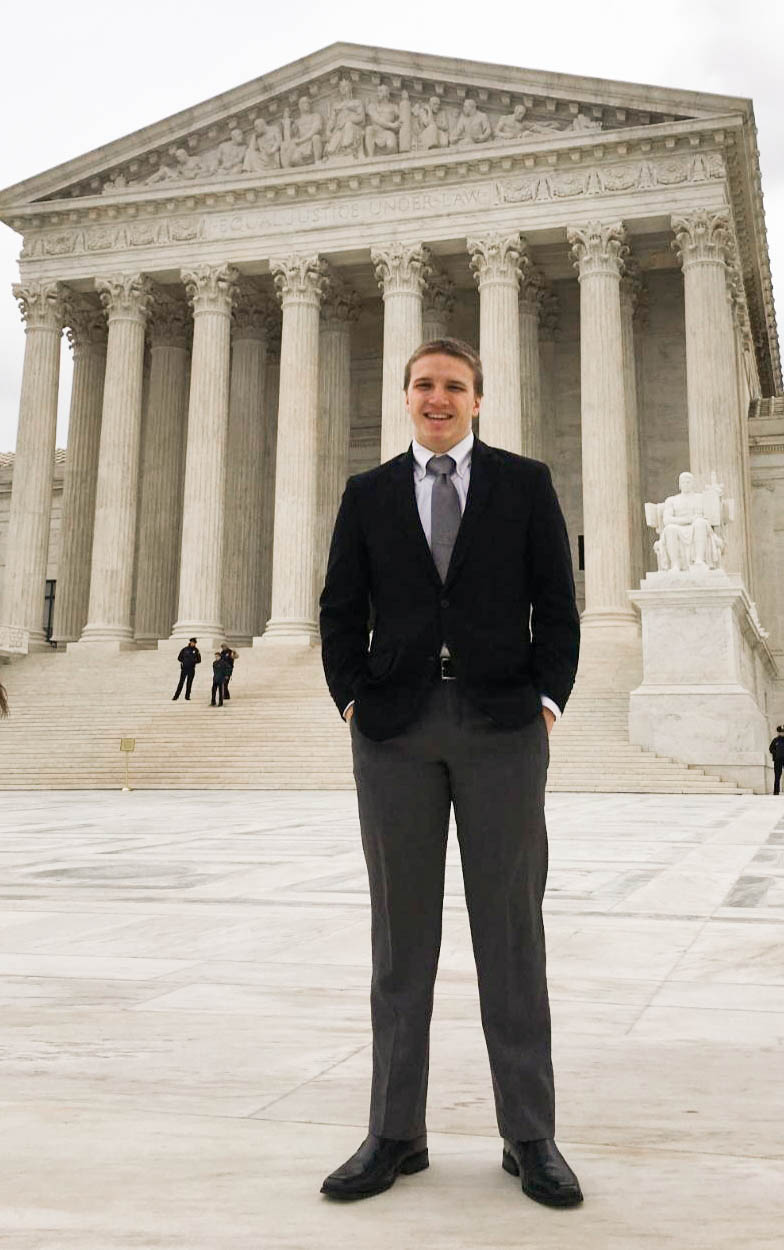 James on the steps of the Supreme Court during a trip to Ohio State